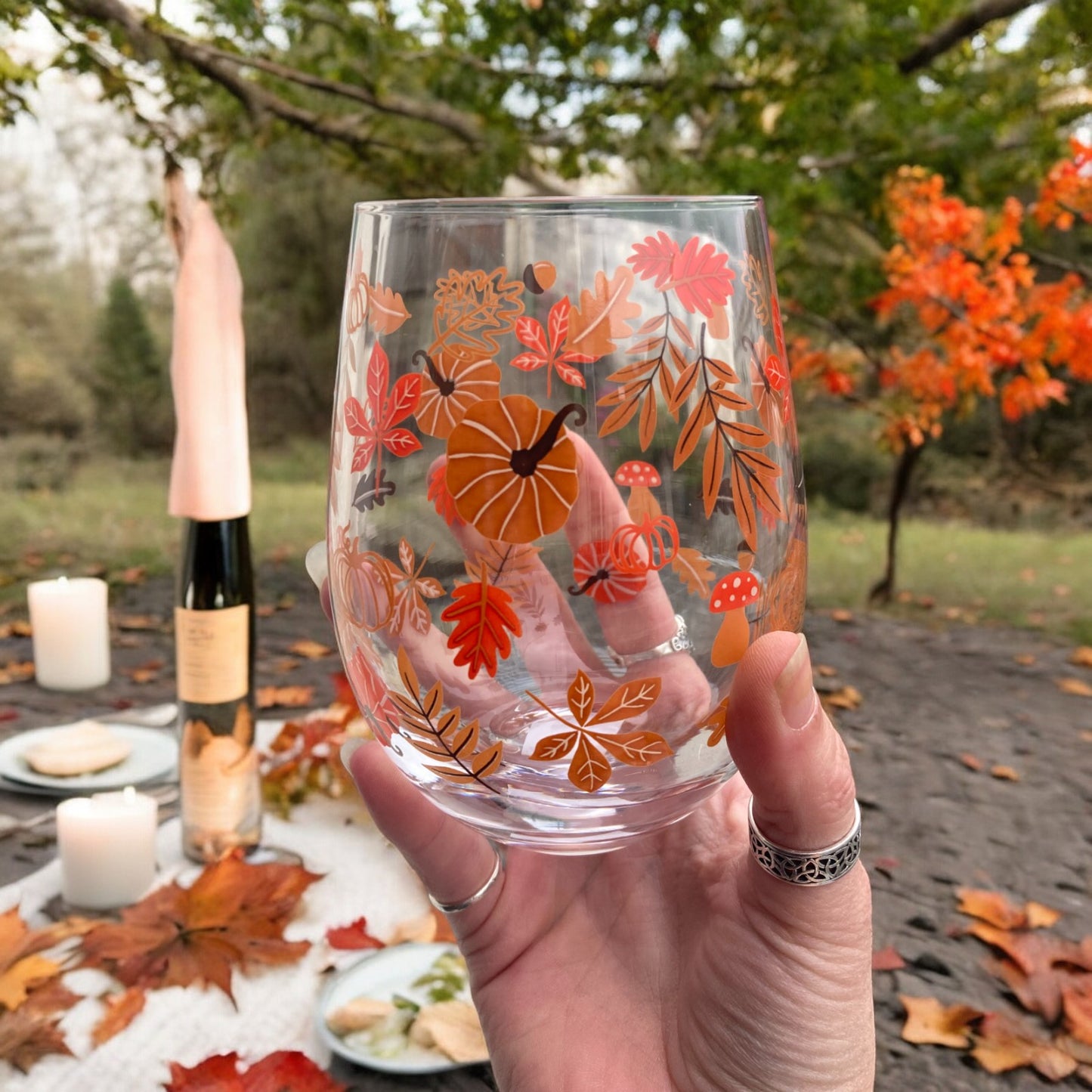 Autumn leaves and pumpkin glass tumbler or stemless wine glass